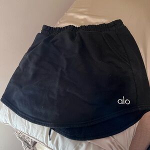 Alo skort in black with silver metallic logo- size small